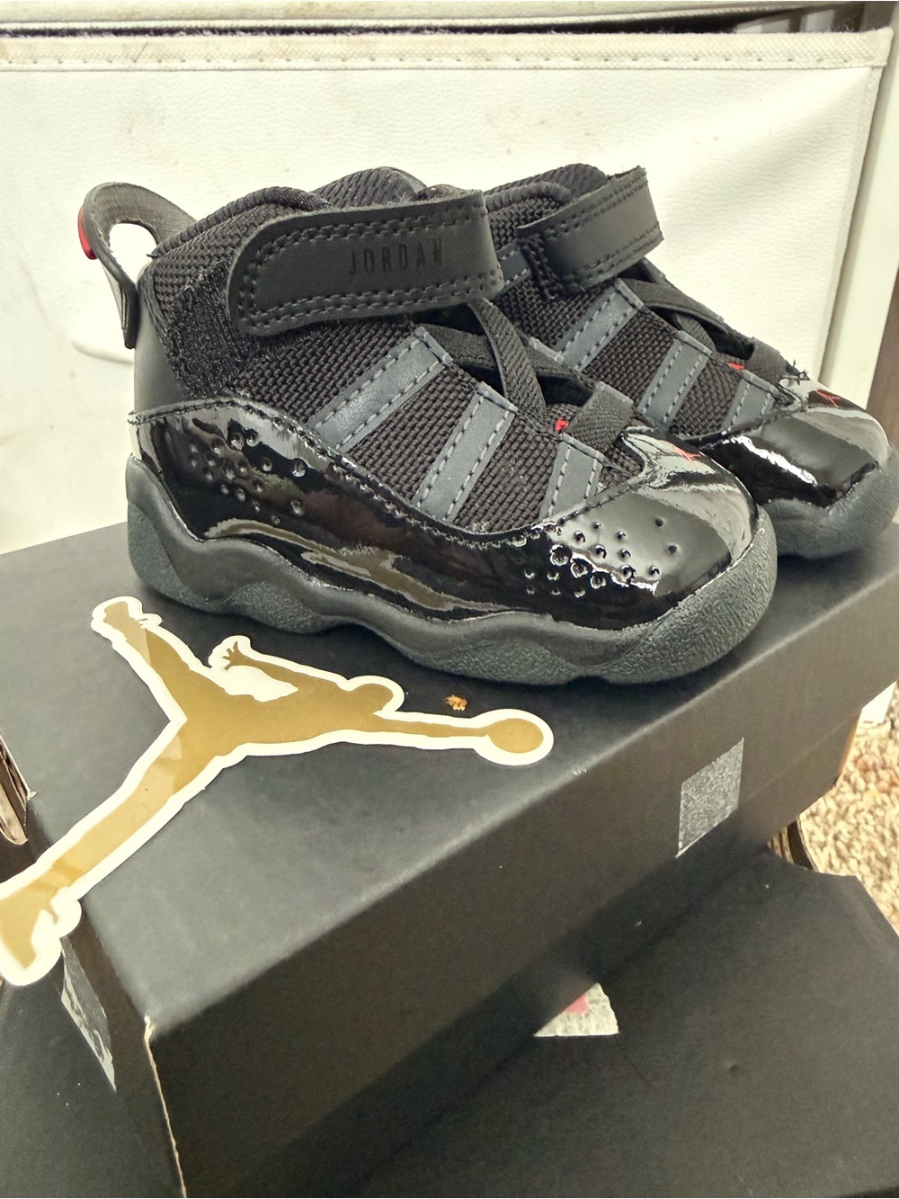 Jordan Kids' Black Patent High-Top Sneakers with Red Accent